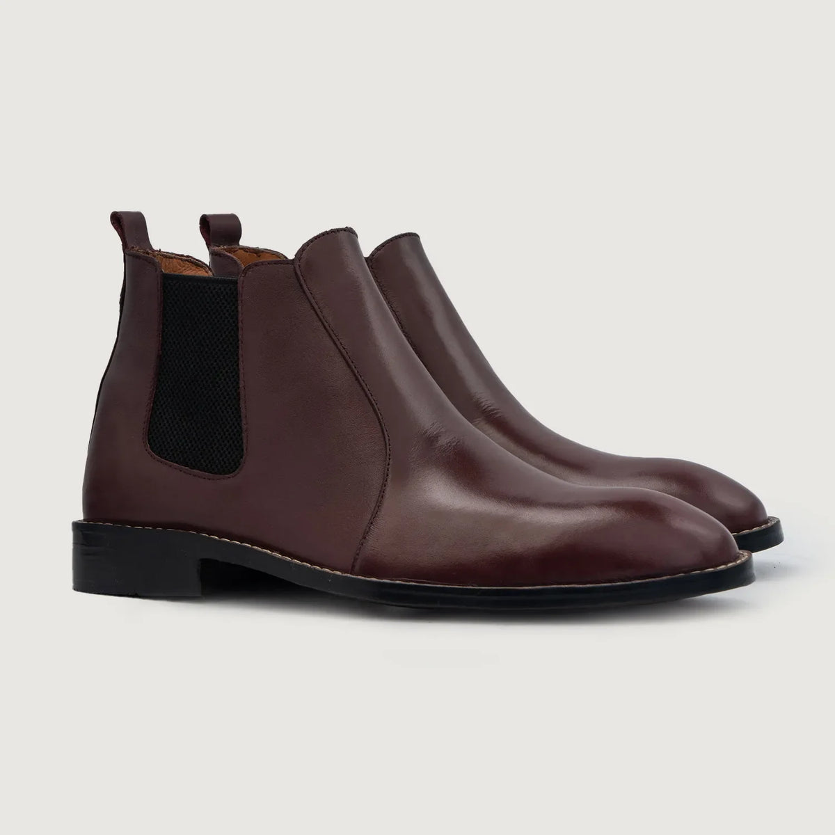 Clarkson Chelsea Granate Botas de cuero para Hombre For Men in Maroon Full-Grain Leather - Vista de perfil | Comprar online