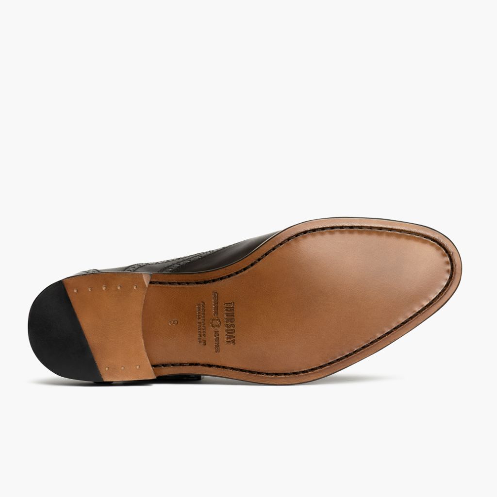 Vista de detalle of Classic Collar & Heavy-Duty Zipper Hardware on Aviator Chocolate Mocasines de cuero para Hombre
