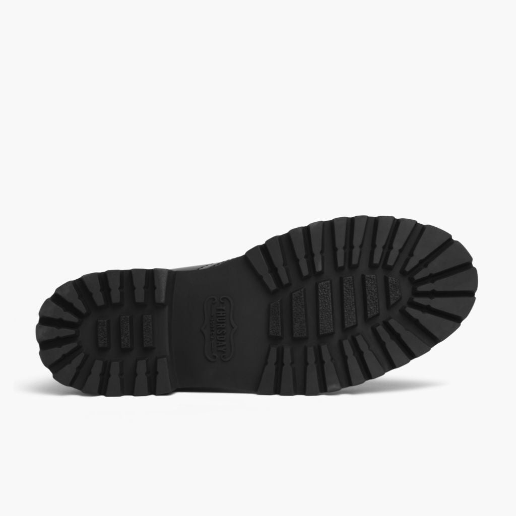 High-Traction Rubber Outsole & Lug Tread Pattern on Captain Negro (Edición StormKing®) Botas de cuero para Mujer