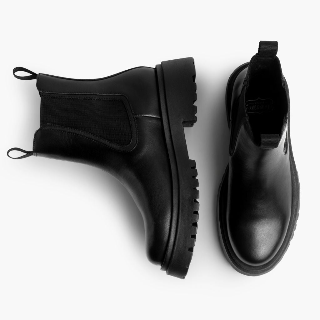 High-Traction Rubber Outsole & Lug Tread Pattern on Legend Platform Negro Botas de cuero para Mujer