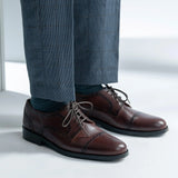 Styled On-Foot Perspective Demonstrating Ankle Fit & Silhouette on Model