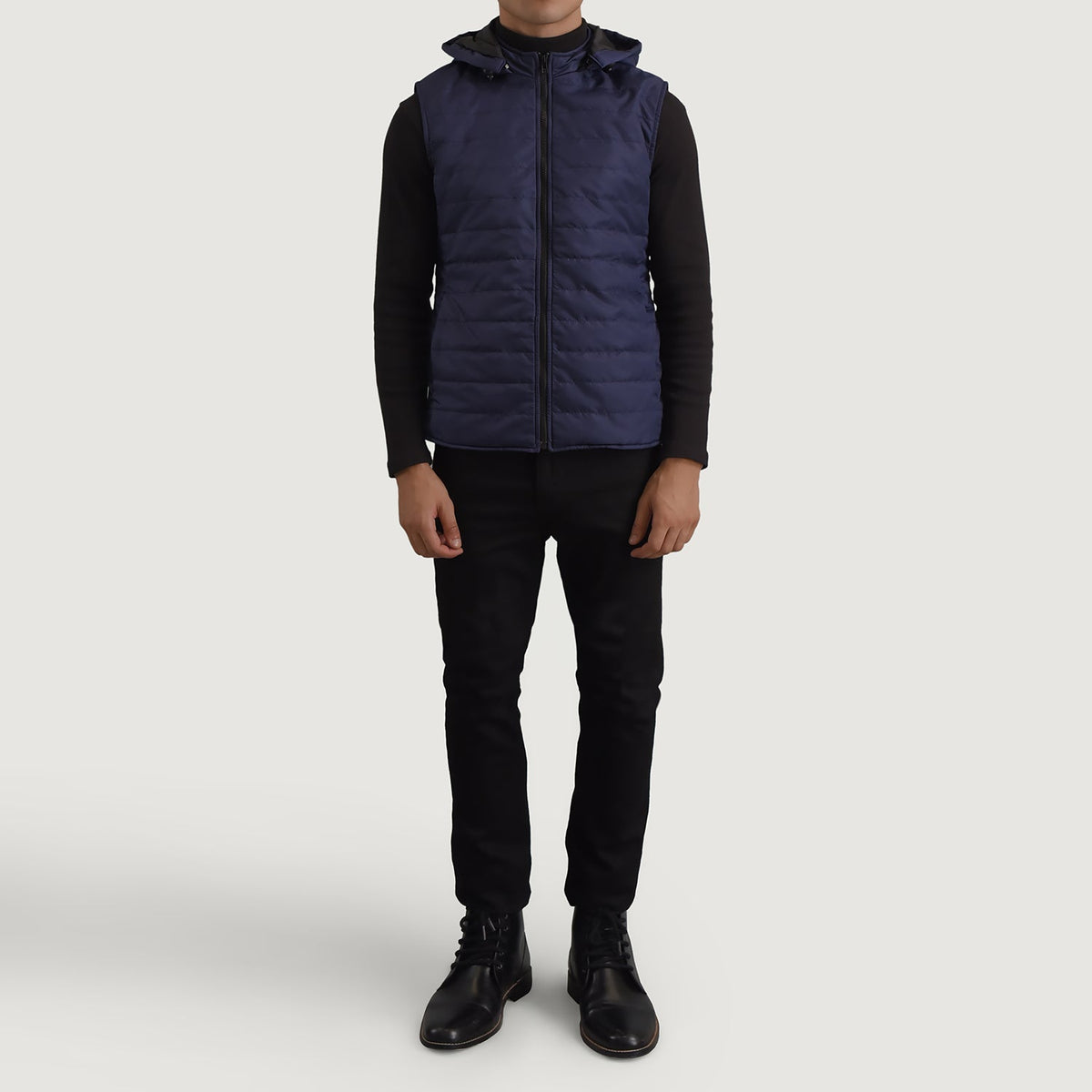 
Carlo Azul Chaleco acolchado con capucha para Hombre - Vista lateral mostrando el corte ergonómico de mangas