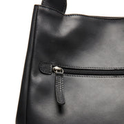 Fioline Full-Grain Leather Handbag para Mujer - Vista de perfil lateral con corte ergonómico de manga
