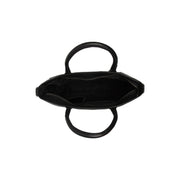 
Pergamino Bolso de mano de cuero flor - Vista lateral mostrando el corte ergonómico de mangas