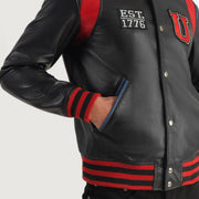 Detalle de cerca of Varsity &amp; Snap Button Hardware on Liberte USA Black Leather Varsity Jacket