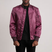 Quinton MA-1 Granate Cazadora Bomber de Cuero para Hombre - Vista de perfil mostrando el corte ergonómico de manga