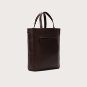 
The Poet Vintage Brown Leather Tote Bag For Men & Women - Perfil lateral estructurado con profundidad de fuelle