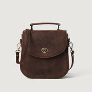 
The Sandra Vintage Distressed Brown Leather Saddle Bag For Women in Distressed Brown Full-Grain Leather - Full Exterior Vista frontal y silueta entallada | Comprar online